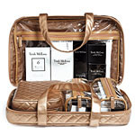 Quilted satin cosmetics organizer with three detachable bags, Trish McEvoy.