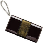 Patent leather evening bag with suede trim, Susan Fitch.