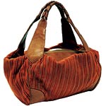 Hand-woven leather bag, Melanie Dizon.