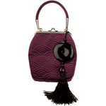 Satin bag with glass-and-nylon tassel, Banana Republic.
