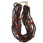 Wood-and-carnelian necklace with gold beads and 14k-gold-plated clasp, Van Ness Designs.