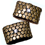 Leather cuffs with brass studs and Swarovski crystals, Allison Daniel Designs.