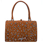 Suede bag with metal grommets, Prada.