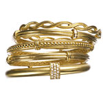 18kt gold, and 18kt gold with diamonds bangles, Slane & Slane.