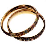 Bangles of 22kt gold and enamel, Amrita Singh.