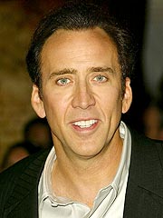 Cage Keeps Movie Crown Away from Colin