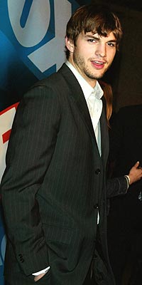 WELL SUITED photo | Ashton Kutcher
