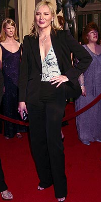 SUITS HER photo | Kim Cattrall