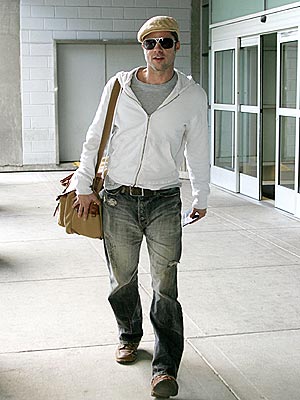 JETTING IN photo | Brad Pitt