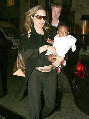 READ HER HIPS photo | Angelina Jolie