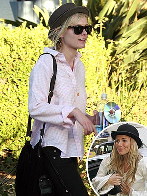 KEEPING A LID ON  photo | Kirsten Dunst