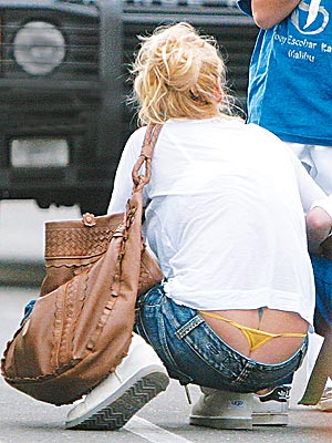 ANYTHING BUTT photo Pamela Anderson Previous 
