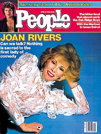 He-e-e-re's Joan!