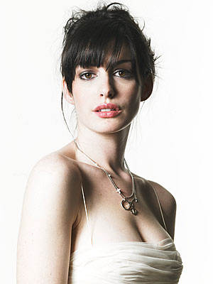 Anne Hathaway with her dark hair and eyes and fair skin has High Value