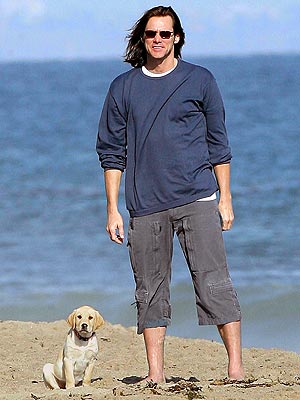 My shaggy-haired owner keeps me entertained when I keep him company. He is: