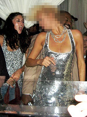 Decked out in silver, this Vegas reveler shimmied the night away this summer. She is: | Paris Hilton