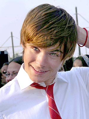 Who graced the first poster that Zac Efron hung on his bedroom wall? | Zac Efron