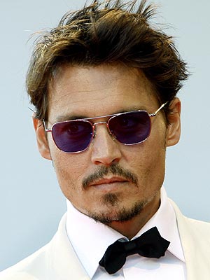 Johnny Depp Homeless. Depp draped his neck