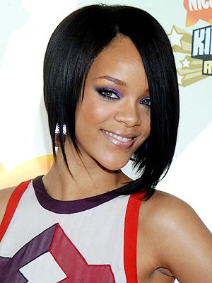 new rihanna hair 2011. And yeahh love that hairstyle