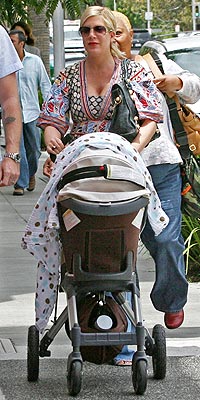 What did Tori Spelling write on her Web site about being a new mom? | Tori Spelling