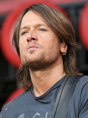 Mens long hairstyles - celebrity hairstyles - layered hairstyle of Keith Urban