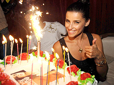 LIGHT HER FIRE! photo | Nelly Furtado