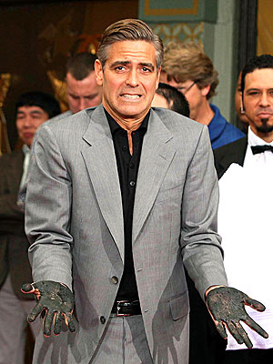 IT'S A DIRTY JOB… photo | George Clooney