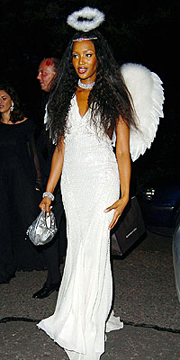 GETTING HER WINGS photo | Naomi Campbell