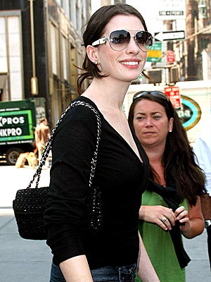 HOW VERY BECOMING photo | Anne Hathaway