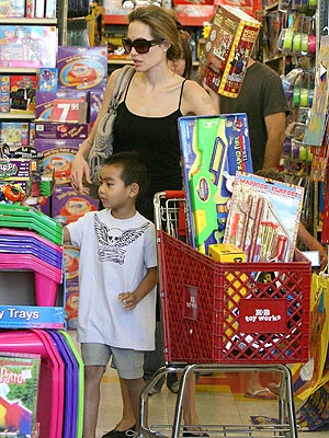 GETTING CARTED AWAY!  photo | Angelina Jolie