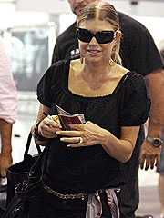 Fergie Makes a Chic Arrival in Australia | Fergie