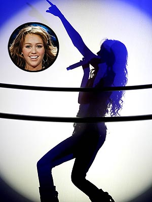 WHO'S THAT GIRL? photo | Miley Cyrus