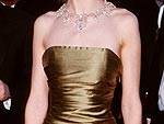 Guess Who's Wearing the Oscar Dress! | Hilary Swank, Jennifer Lopez, Kim Basinger