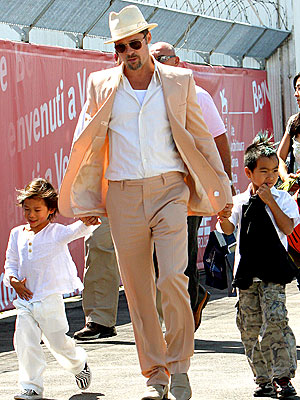 RETURN TRIP photo | Brad Pitt, Maddox Jolie-Pitt, Pax Thien Jolie-Pitt