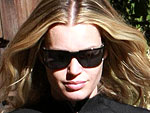  | Rebecca Romijn
