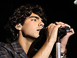 Jonas Brothers Strip – to Undershirts – for Fans