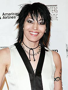 Hard Rocker Joan Jett Attends Ferret Homecoming Party
