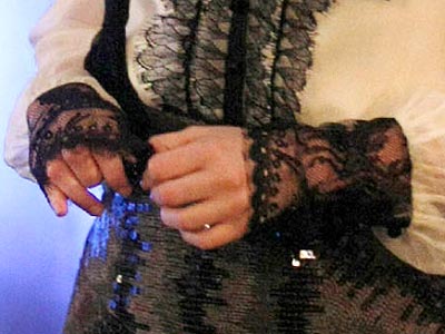 Which bad girl channeled Madonna in these lacy gloves?