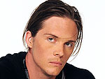 Project Runway's Logan Signs Auf