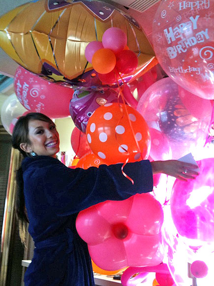 UP, UP AND AWAY photo | Cheryl Burke