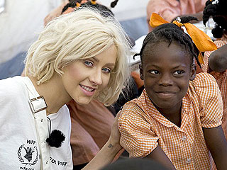 PHOTO: Christina Aguilera Feeds Haiti Refugees