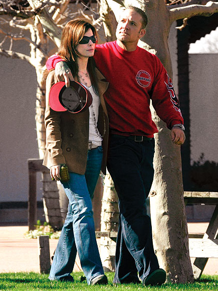 WRITTEN IN INK photo | Jesse James, Sandra Bullock