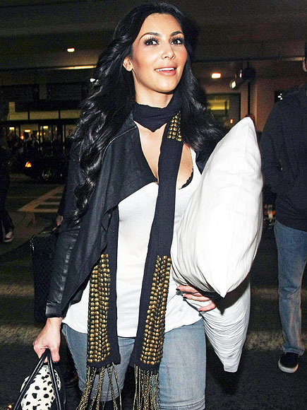 TRAVELING LIGHT photo | Kim Kardashian