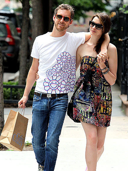 AT ARM'S LENGTH  photo | Anne Hathaway