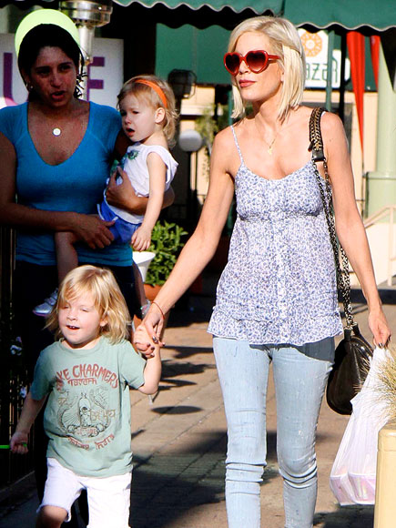 THREE FOR THE ROAD photo | Tori Spelling