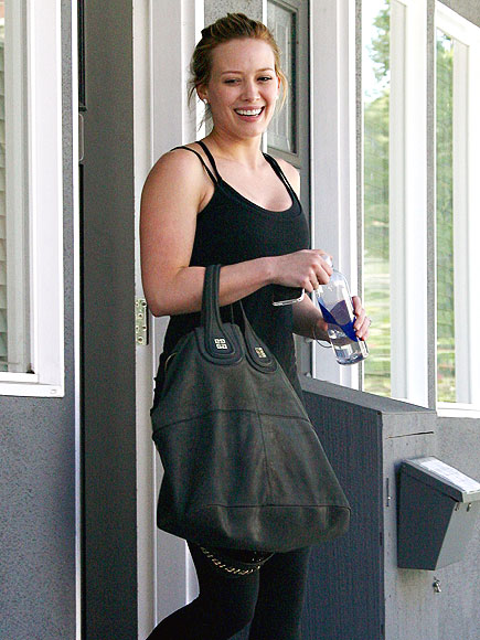 A BIG STRETCH photo | Hilary Duff