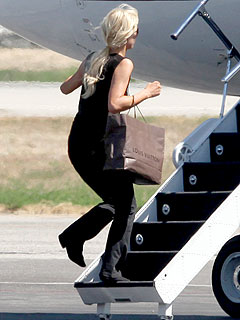 Paris Hilton Jets Off to Asia on Business After Plea Deal| Paris Hilton