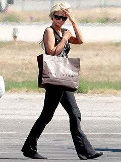 Paris Hilton Jets Off to Asia on Business After Plea Deal