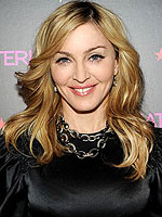 Madonna Donates Boots