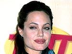 9 Years Ago: Angelina Jolie's Bashful SAG Awards Win